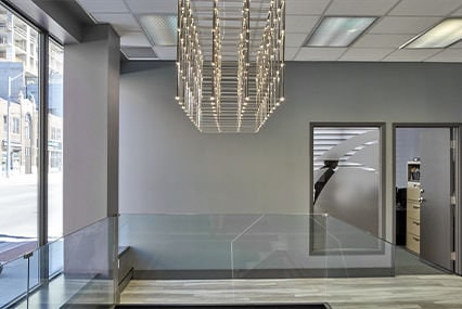 hallway with glass railing